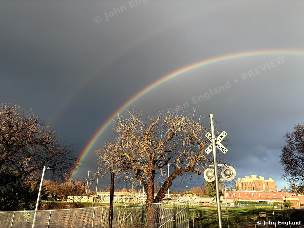 Double Rainbow at the Crossing – Double rainbow over the Chico State fields and rail crossing, Chico, CA.