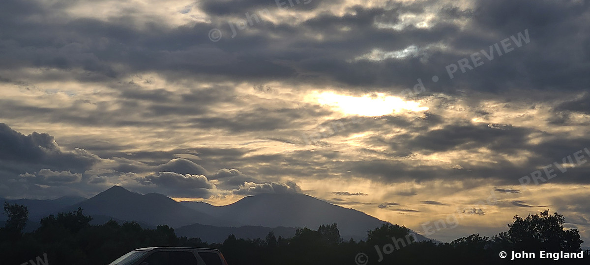 Evening Light over the Mountains – Evening light breaking over the mountains near Redding, Shasta County, CA, Jun 13, 2020.