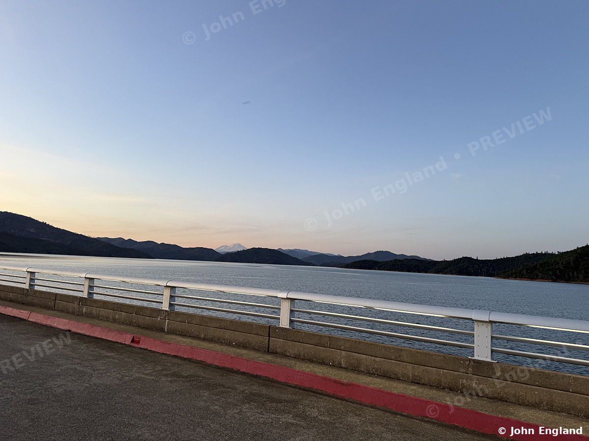 Shasta Dam Walkway at Dusk – Shasta Lake from the Shasta Dam walkway at dusk, Shasta County, CA.