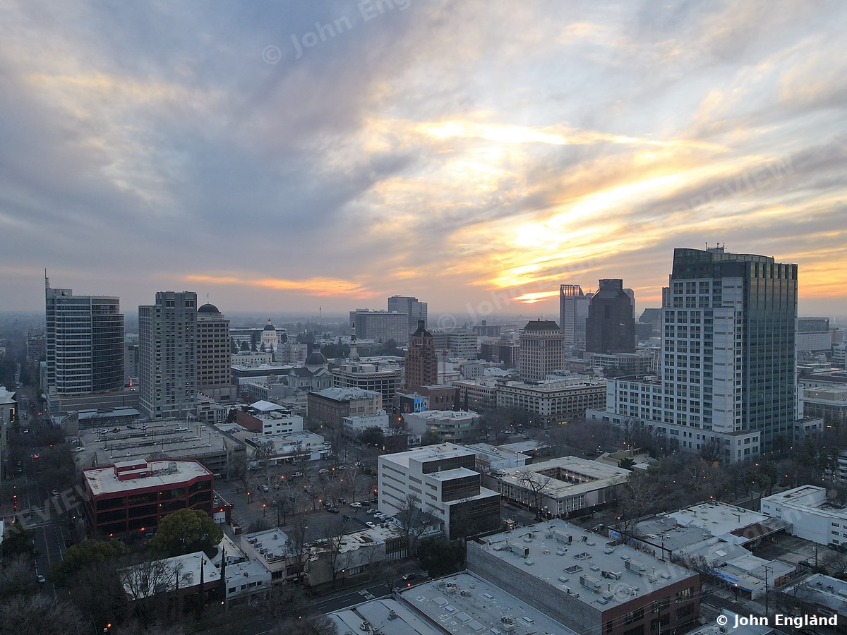 Downtown Sacramento Sunset, Aerial – Sunset over downtown Sacramento, aerial view, Sacramento, CA. Jan 13, 2022. John England.