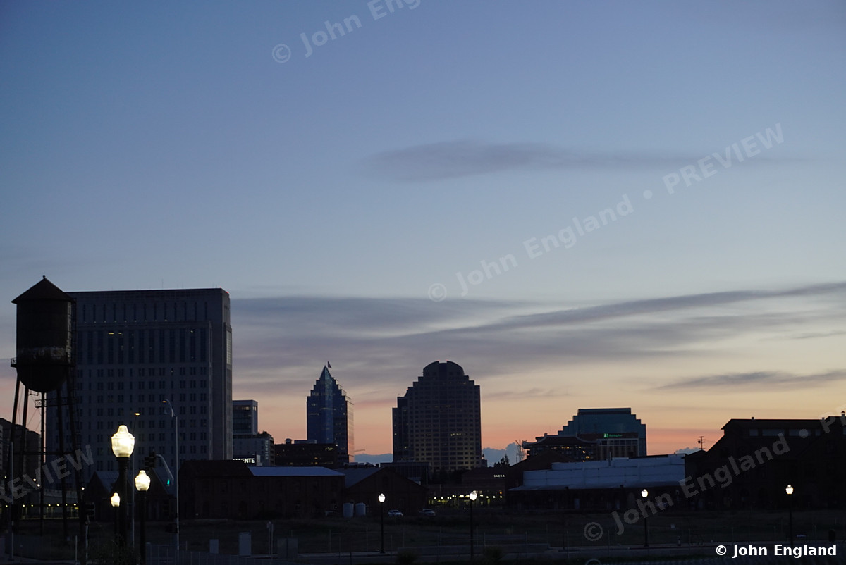 Dusk Skyline with Water Tower – Dusk skyline silhouette with water tower.