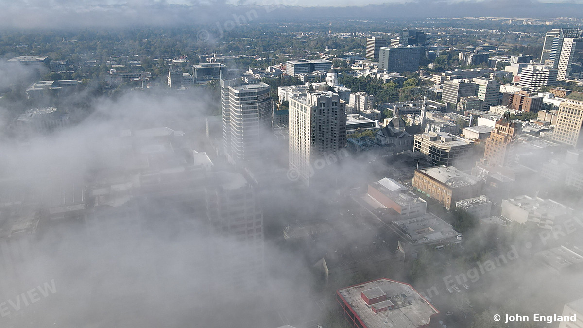 Fog over Downtown Sacramento – Aerial view of fog drifting through downtown Sacramento, CA. Mar 2022. John England.