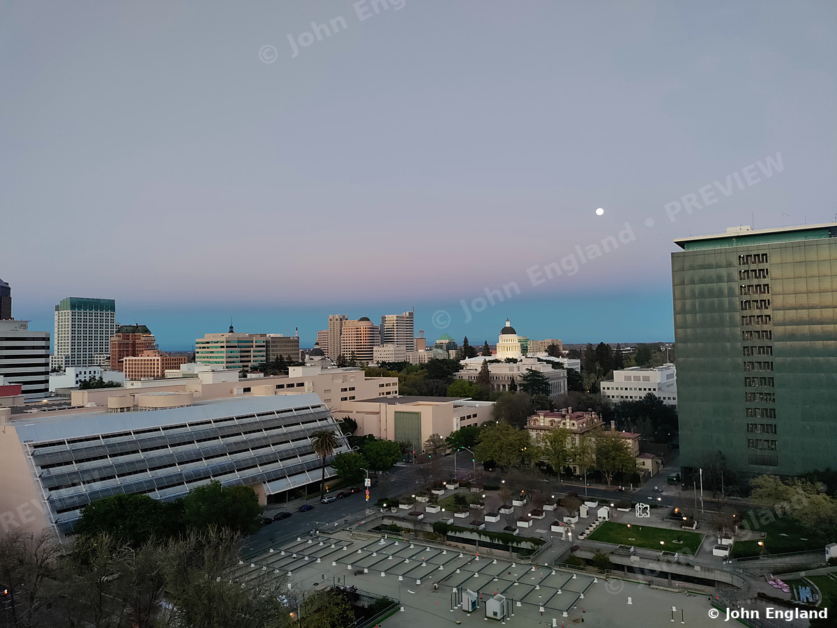 Moonrise over the Capitol – Moonrise over downtown Sacramento at dusk, Mar 27, 2021.