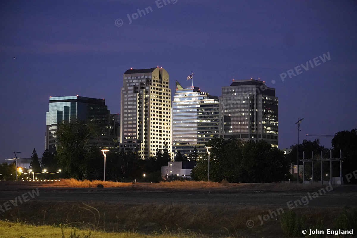 Sacramento Skyline at Blue Hour, Summer – Downtown Sacramento skyline at blue hour, Sacramento, CA. July 2021. John England.