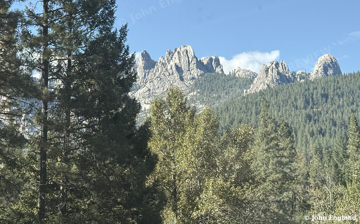 Castle Crags Above the Forest – Castle Crags above the forest, seen from I-5, CA. Sep 5, 2026. John England.