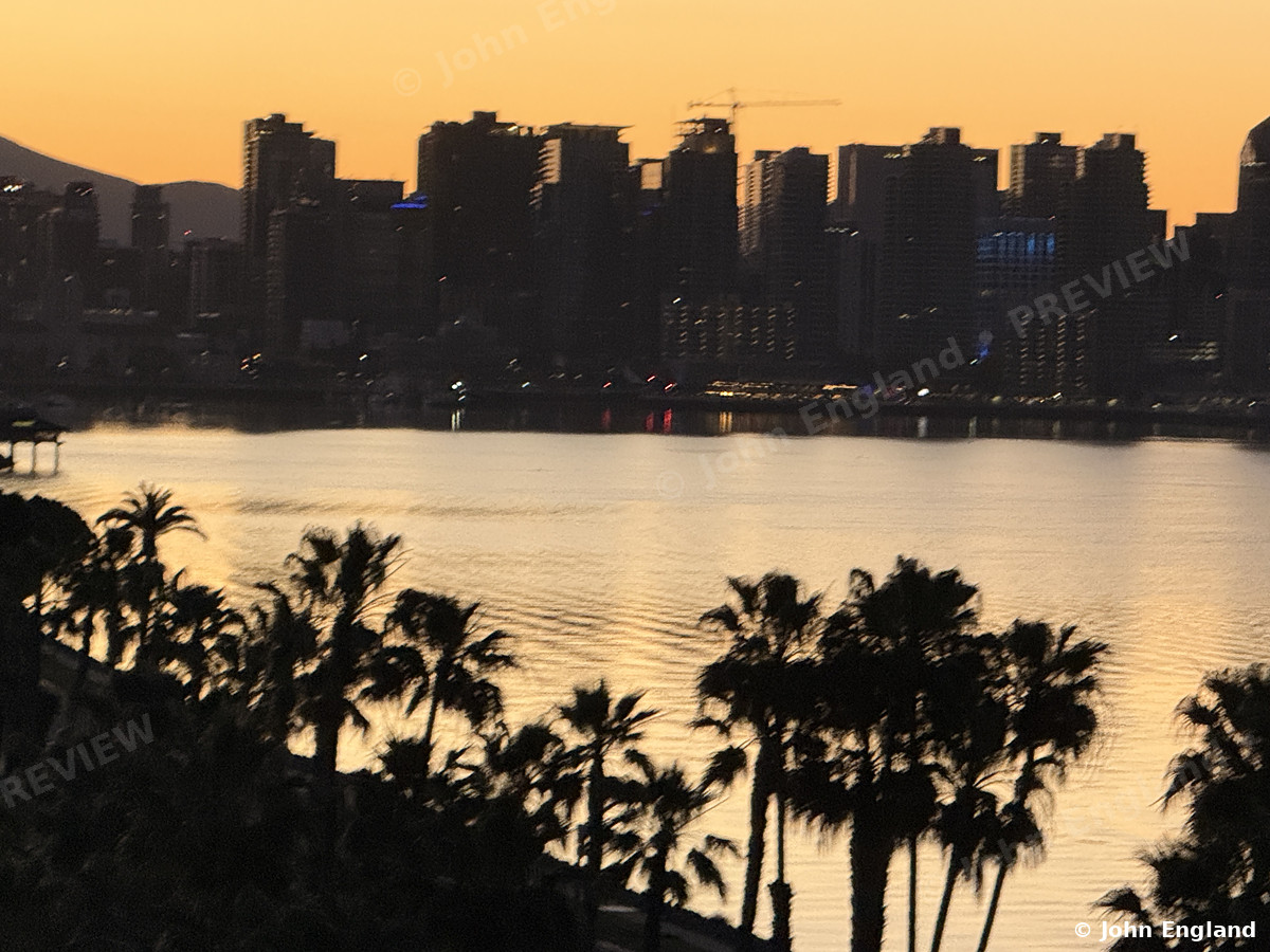 Downtown San Diego Silhouette at Sunrise – Downtown San Diego silhouetted at sunrise, from Shelter Island, CA. Mar 8, 2026. John England.