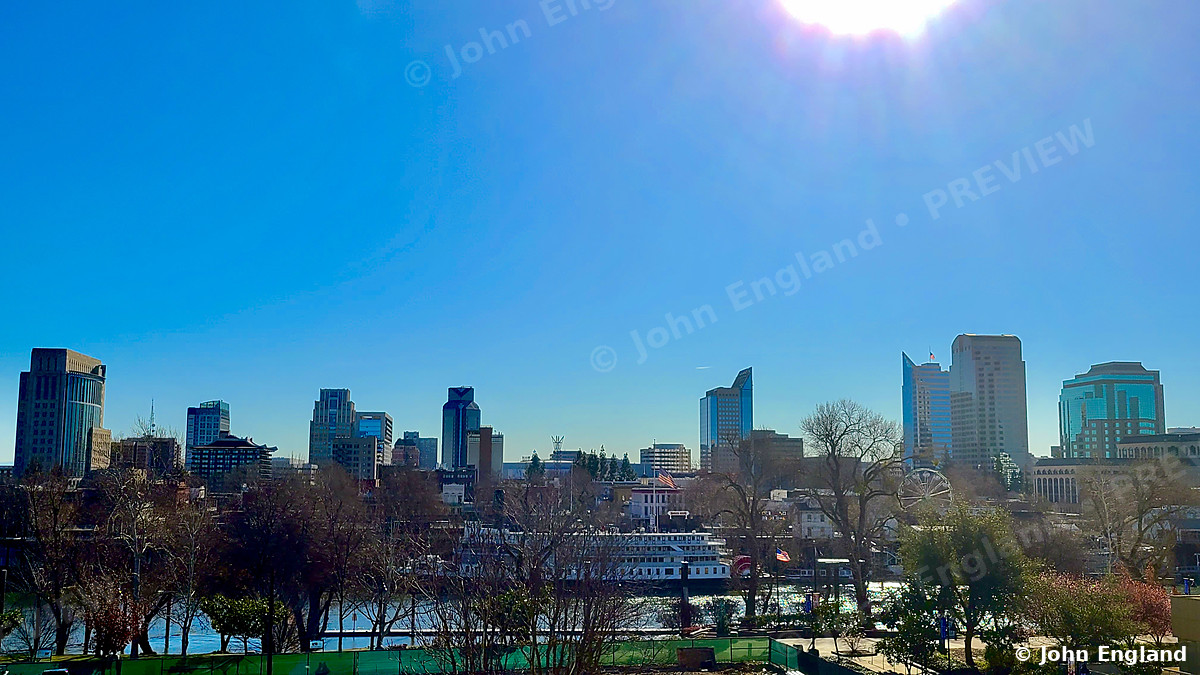 Sacramento Skyline Morning – Sacramento skyline in the morning from the West Sacramento riverfront, CA. Feb 24, 2021. John England.