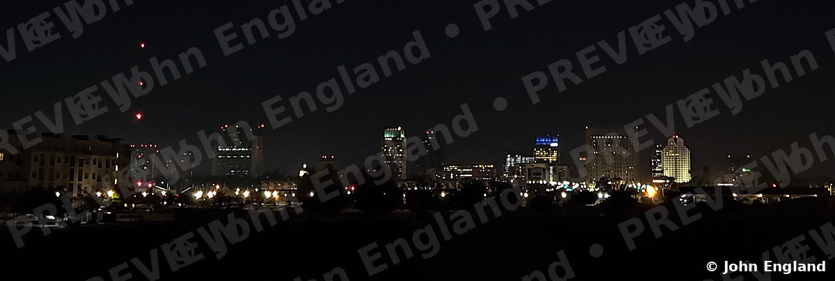 Sacramento Skyline Night Panorama – Sacramento skyline at night, panorama from north Sacramento, CA. Nov 29, 2020. John England.