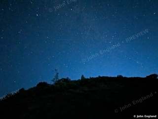 Milky Way over the Ridge – Summer stars and Milky Way glow over a ridgeline, Shasta Lake, CA.