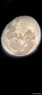 Gibbous Moon – Gibbous moon on black sky.