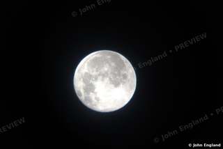 Moon in Haze – Full moon with soft glow.