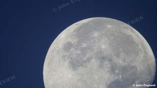 Moonset in Blue – Setting full moon against a clear blue morning sky, Chico area.