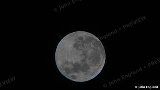 Small Full Moon – Full moon on black sky.