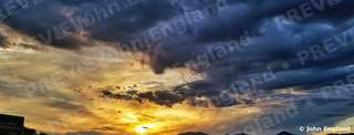 Storm Ridge Sunset – Storm-light sunset over a mountain ridge, Northern California.