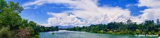 Summer River Panorama – The Sacramento River near Redding under summer clouds, May 30, 2019.