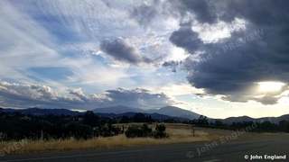 Valley Storm Clouds – Storm clouds over a valley ridge, Northern California, Jul 2, 2019.