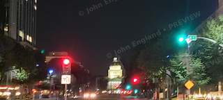 Capitol at Night from the Street – State Capitol dome glowing beyond traffic lights, Sacramento, CA, Sep 8, 2021.