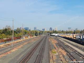 Rails to the Skyline – Railroad tracks toward the Sacramento skyline, Oct 19, 2021.
