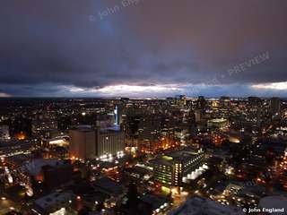 Sacramento at Dusk, Aerial – Aerial view of downtown Sacramento at dusk under heavy clouds, CA. Dec 23, 2021. John England.