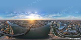 Sunrise River Planet Panorama – 360 drone panorama at sunrise over the river and city.