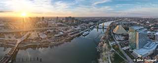 Sunrise River and Skyline – Aerial sunrise crop over the river, bridges and downtown.